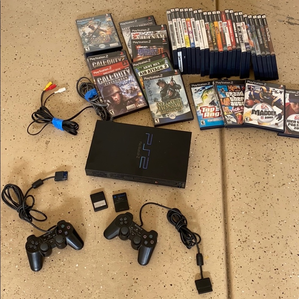 Play station 2 PS2 with 35 games complete system.